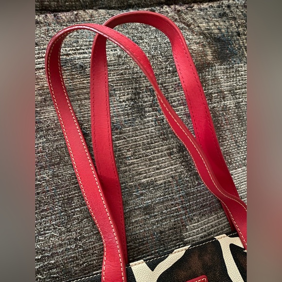 Dooney & Bourke giraffe print tote with red strap. - Picture 4 of 15